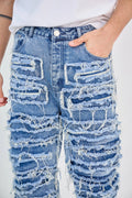Faded Blue Jeans with Fringes and Seams