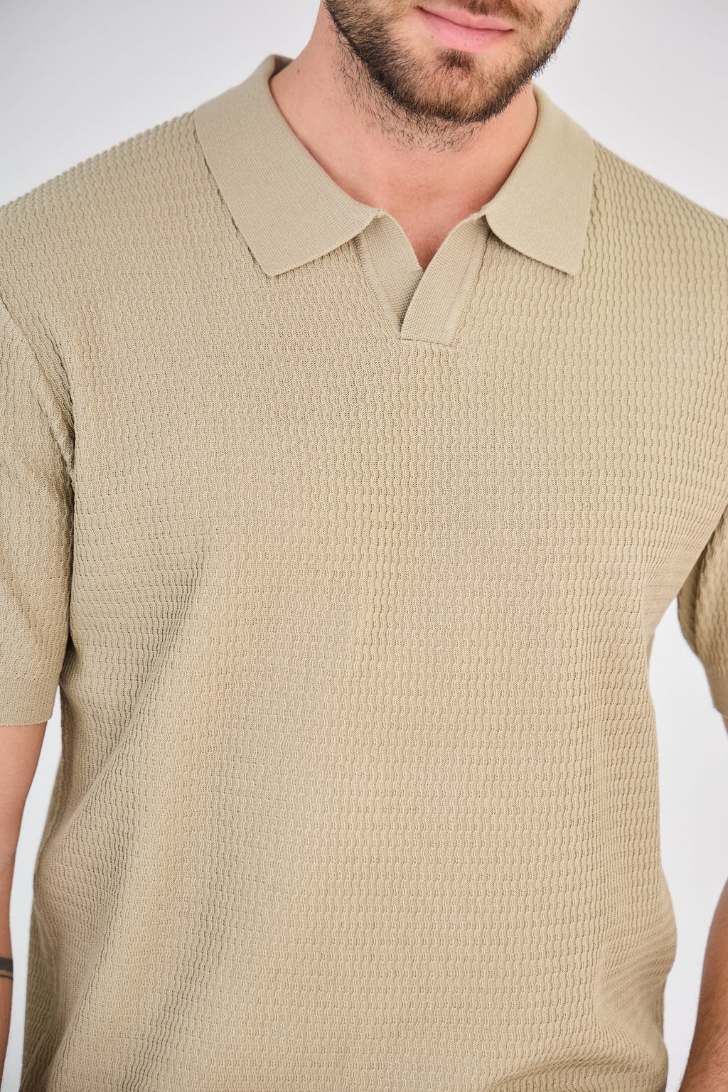 Polo texturé en maille piquée sable