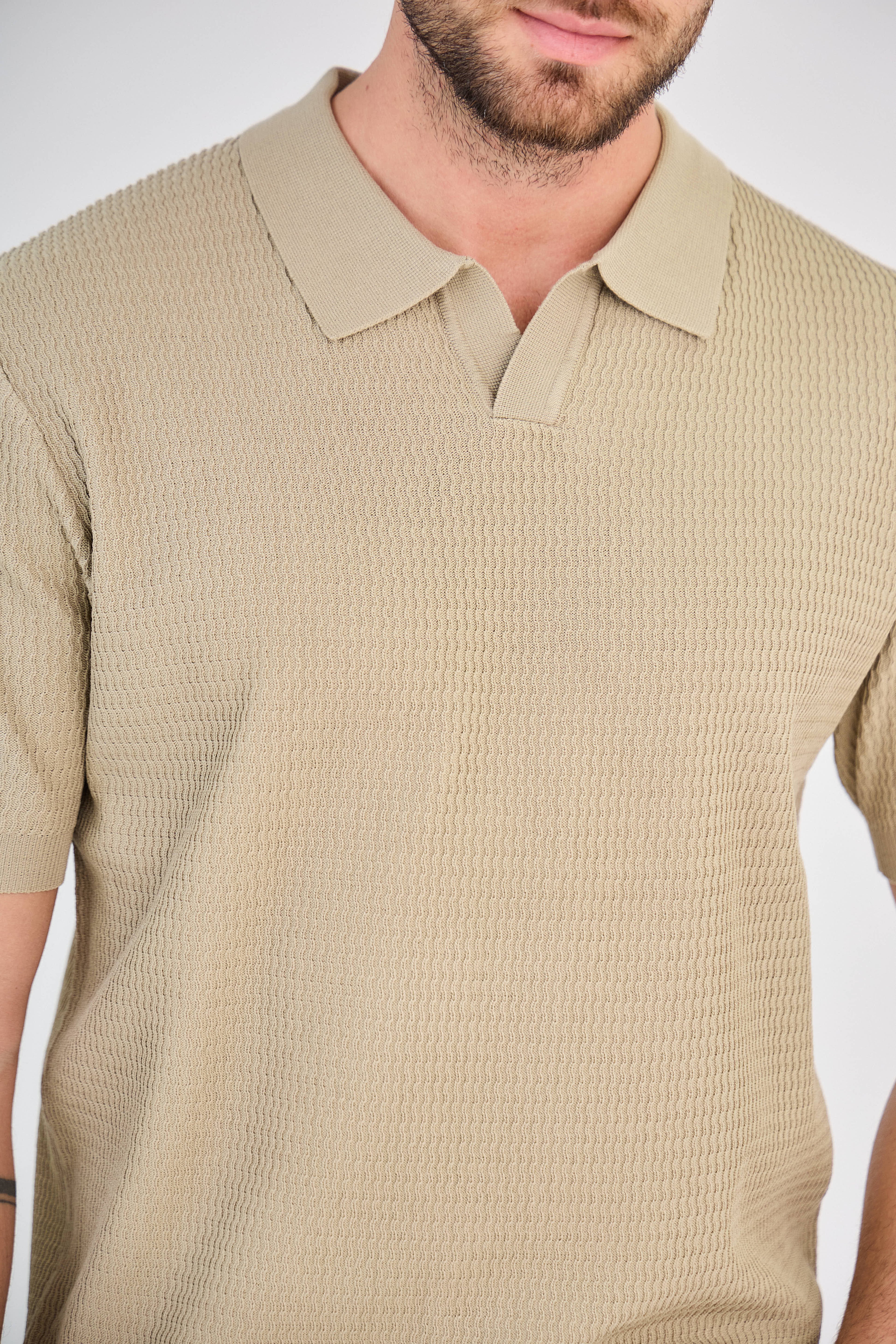 Polo texturé en maille piquée sable