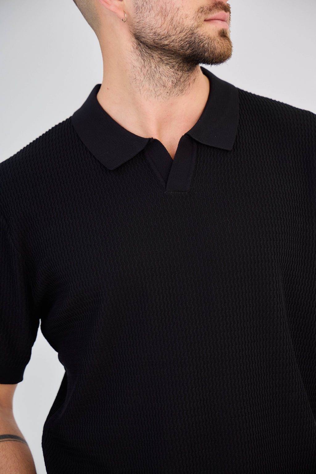 Polo texturé en maille piquée Noir
