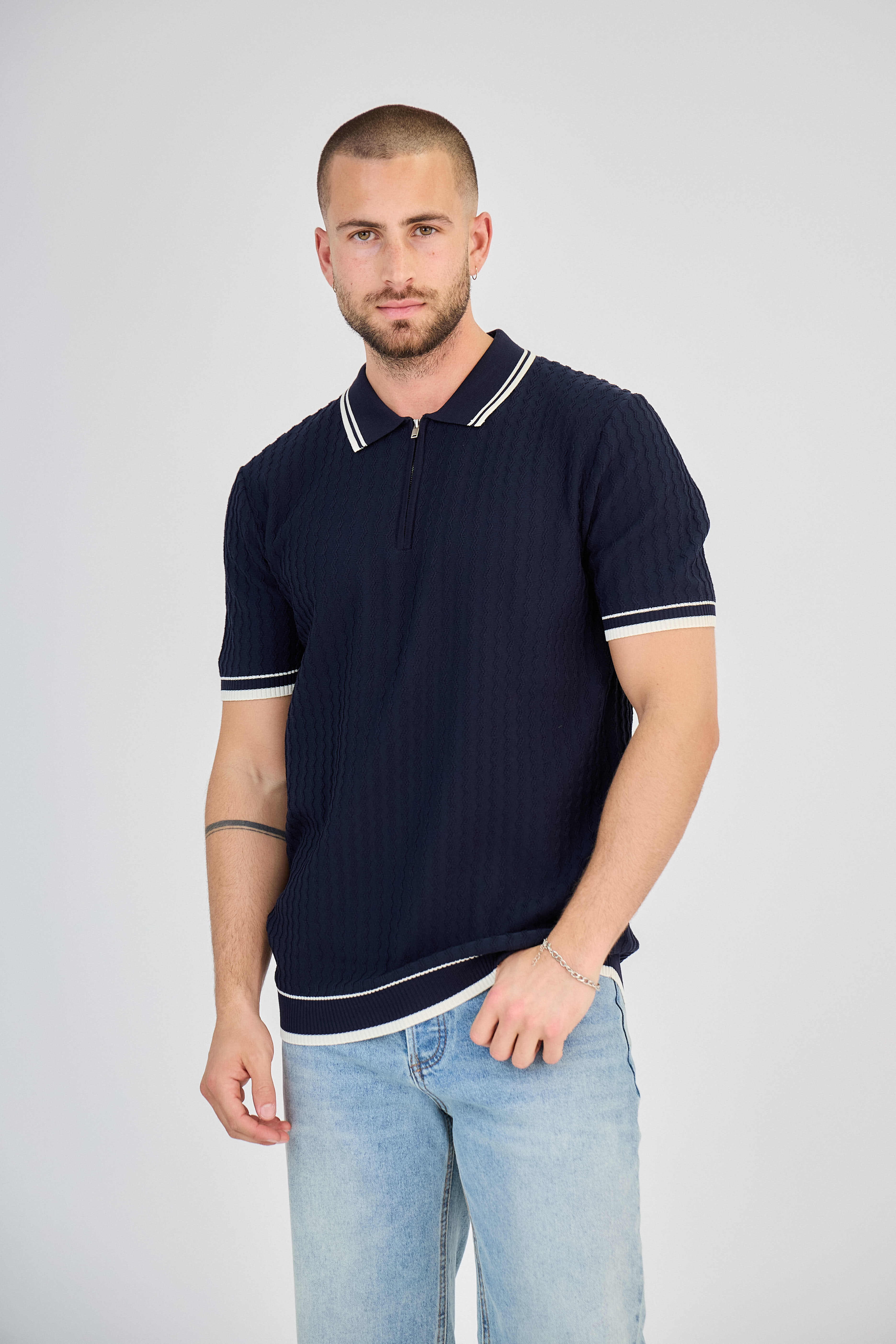 Polo zippé en maille torsadée marine