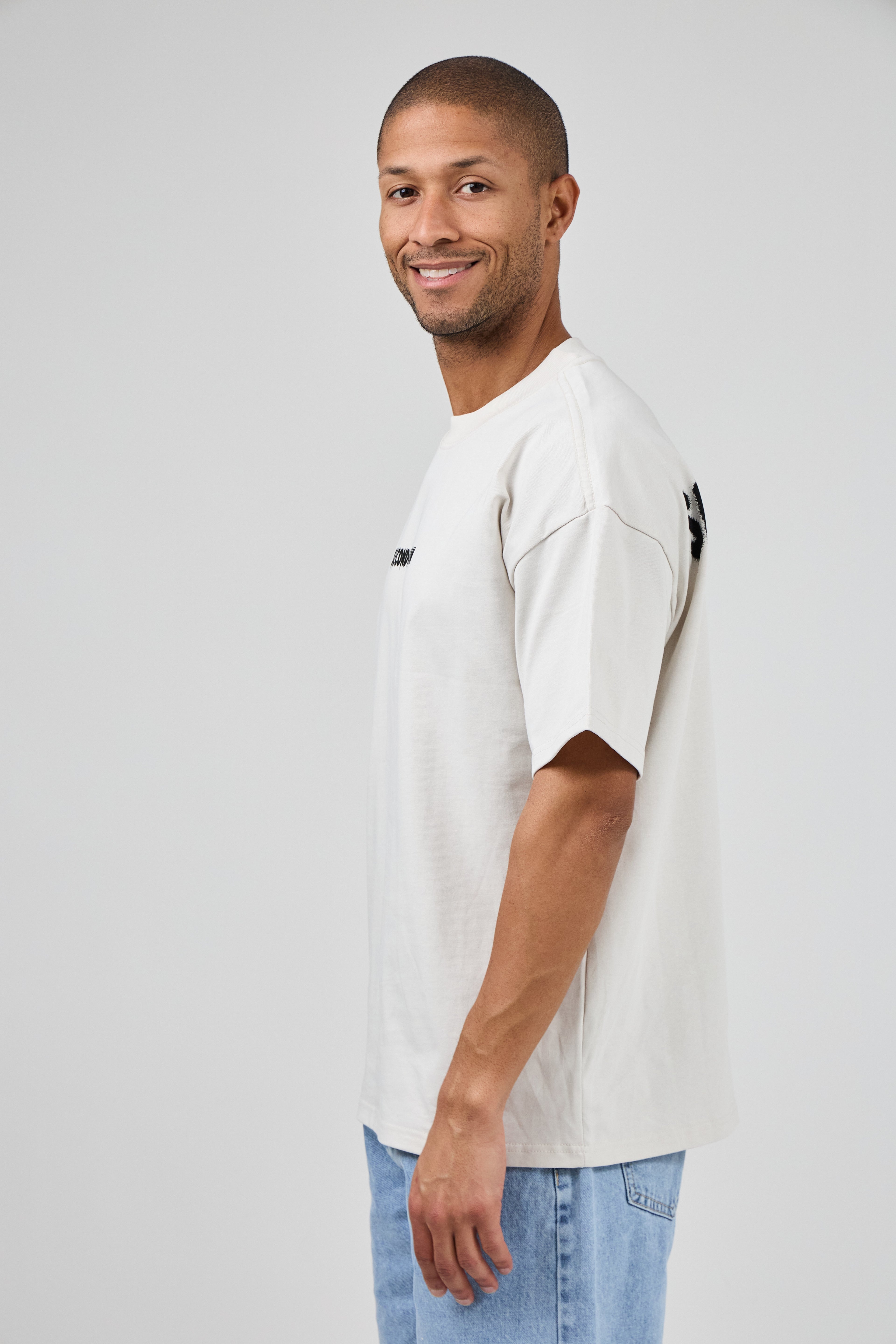 T-shirt oversize à logo imprimé “SECONDE SAISON”