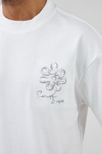 T-shirt homme coupe décontractée avec broderie florale artistique et motif graphique au dos