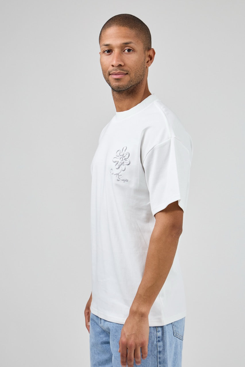T-shirt homme coupe décontractée avec broderie florale artistique et motif graphique au dos