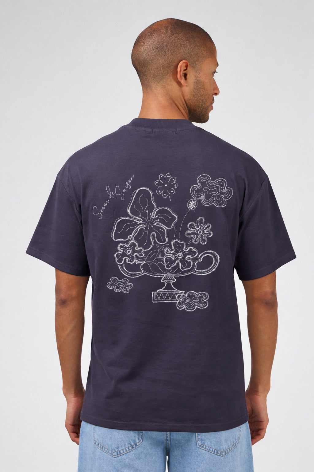 T-shirt homme coupe décontractée avec broderie florale artistique et motif graphique au dos