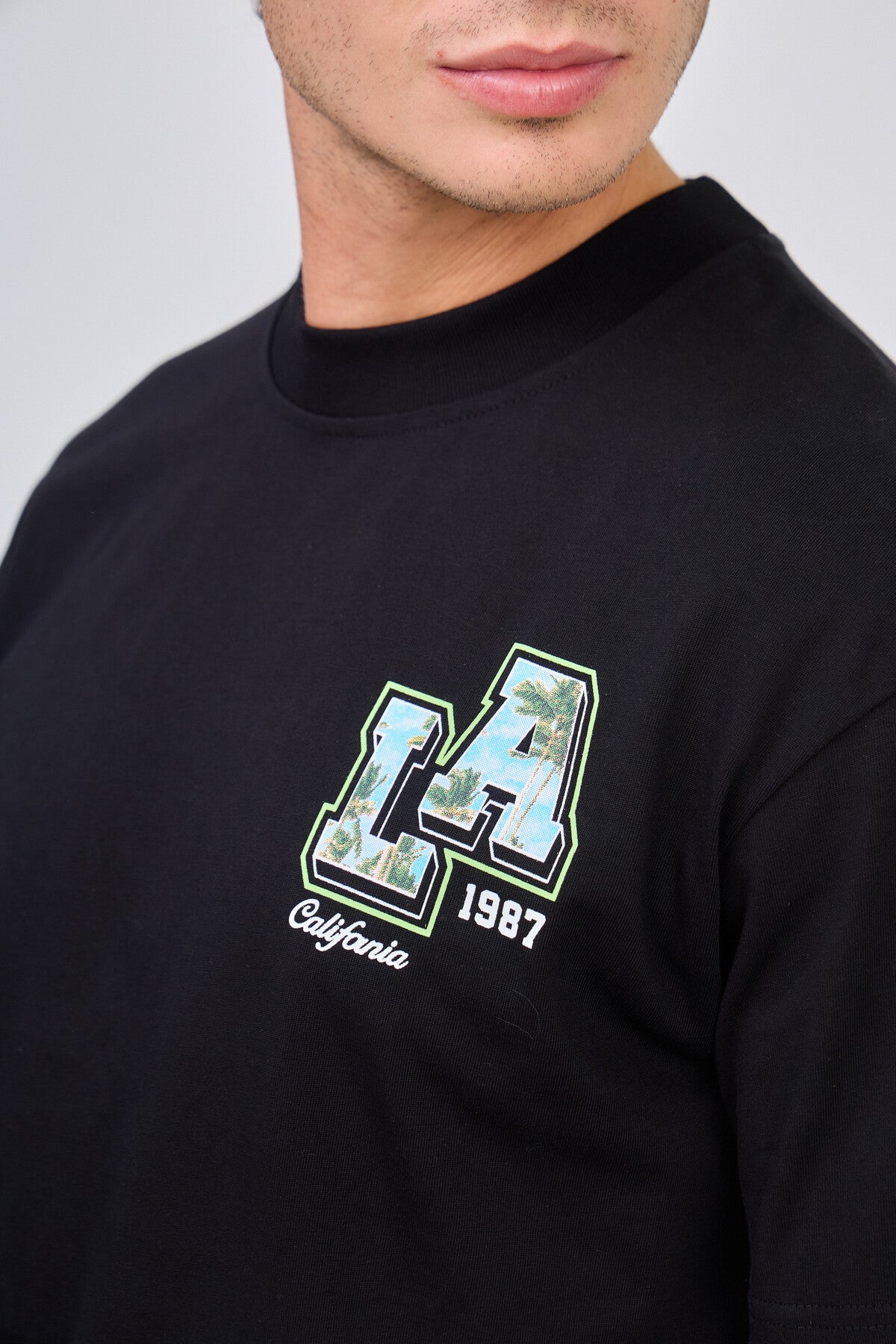 Black T-Shirt with "LA California 1987" Print